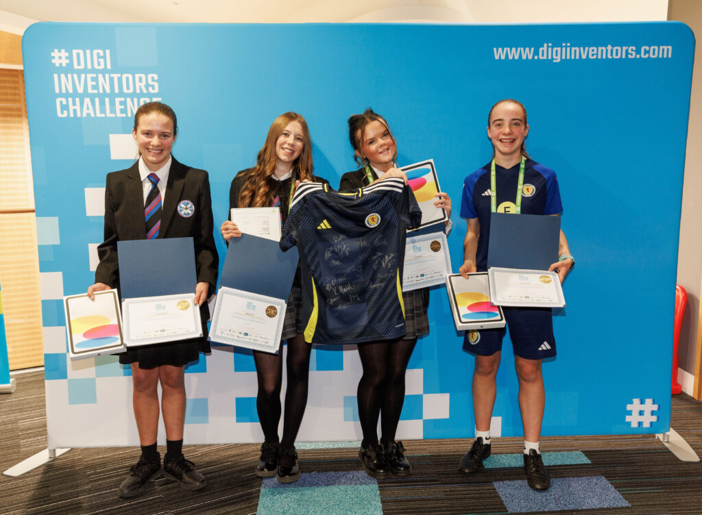 TrainHer app creators Maya Barcella, Sophia Barcella, Hannah Lee, and Lucy Waters receive DigiInventors Challenge awards at ceremony