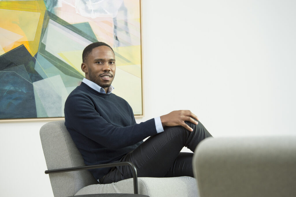 Daniel Muranda, Principal at SEP, seated in an office armchair, commenting on the IntelliSense.io SEP investment in a release covered by Hot Tin Roof, PR agency for deep tech and energy.