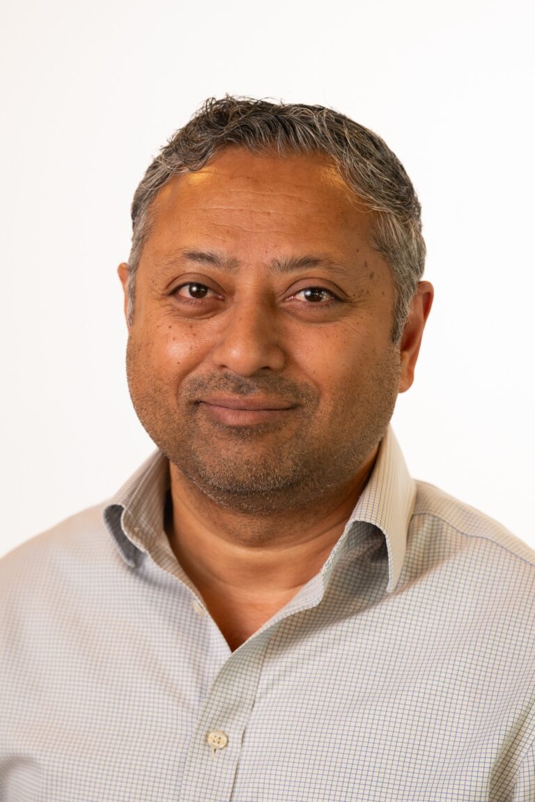 Sam Bose, Founder and CEO of IntelliSense.io, studio headshot, commenting on the IntelliSense.io SEP investment in a story supported by Hot Tin Roof, PR agency for deep tech and science sectors.